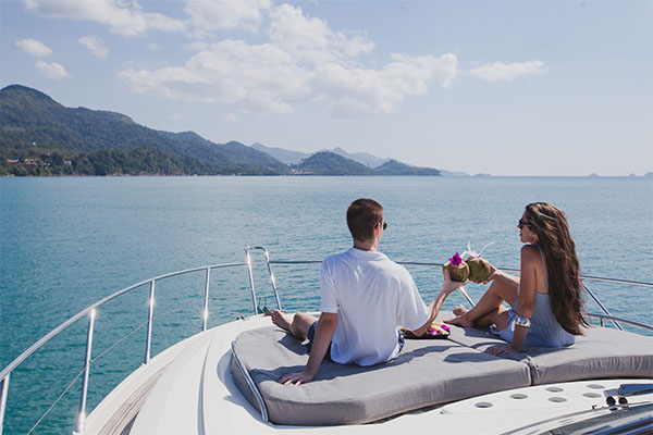 Couple,Enjoying,Honeymoon,Onboard,Of,Luxury,Boat,,Luxurious,Yacht,In